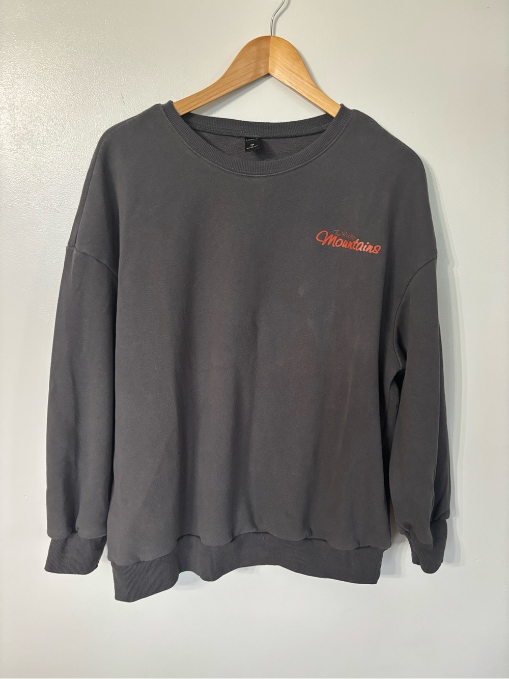 Gray Crewneck Sweatshirt with Orange 'Mountains' Script